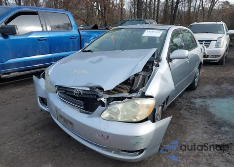 2005 Toyota Corolla Le z USA, uszkodzony, nr VIN 2T1BR32E15C409033